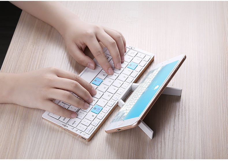 BOW Hangshi folding bluetooth keyboard wireless portable mobile phone tablet universal portable rechargeable cross-border special supply